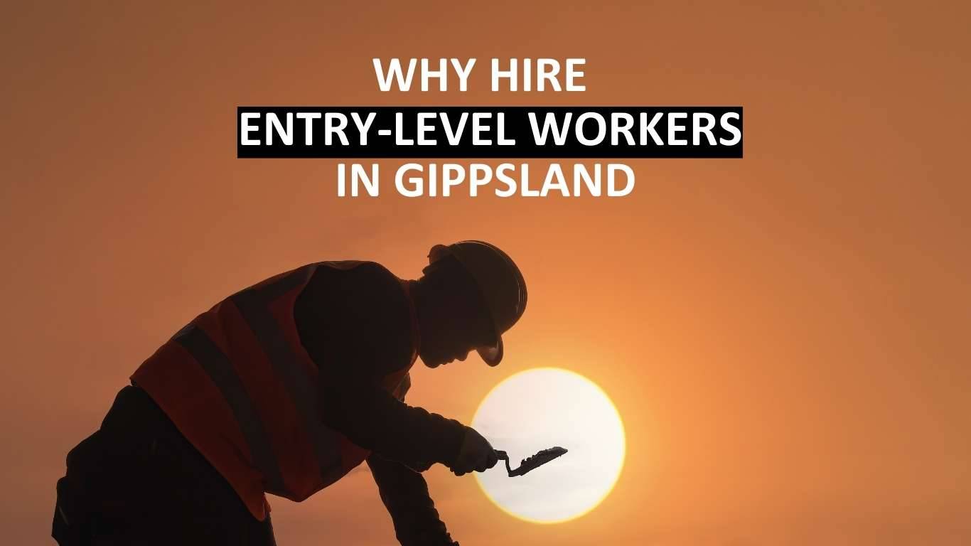 Construction worker on site with sunset in the background and the words "why hire entry-level workers in Gippsland"
